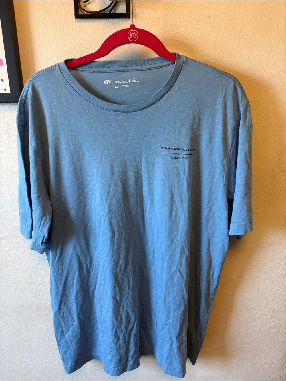 Travis Mathew Light Blue Short Sleeve Tee with Chest Logo